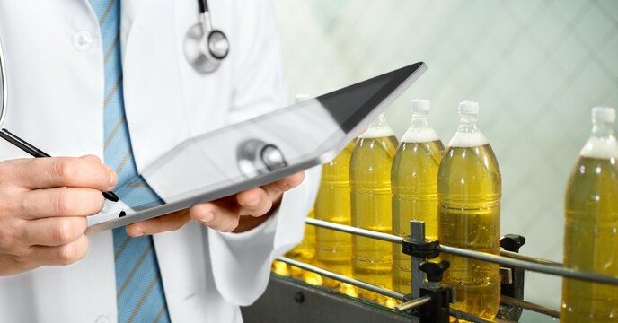 Manufacturer worker checking product use digital tablet