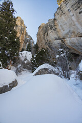 Fototapeta na wymiar Rock walls at Robbers Roost trail in snow at Spring Mountain National Recreation Area, Nevada