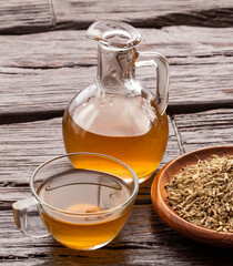 Herbal infusion fennel tea in glass cup and glass tea - Foeniculum vulgare