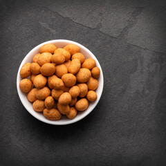 Organic mexican peanuts in the bowl - Arachis hypogaea