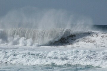 High waves and stormy ocean. Big waves with a foamy crest. Photo of Fuerteventura in the Canary Islands, Spain.