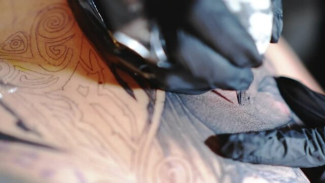 From Light to Dark: A Tattoo Artist's Whip Shading Method