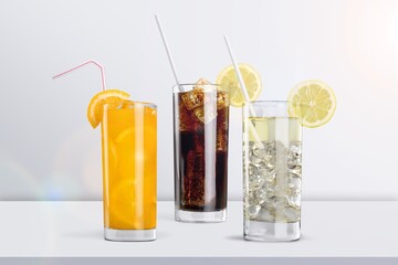 Set of drink, cola, soda and lemonade in glasses.