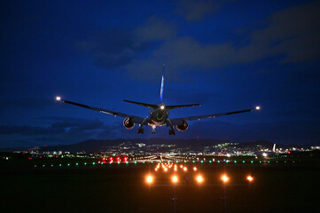 Fototapeta na wymiar Landing at Itami Airport in the evening