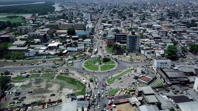 Static aerial view of traffic at Rond-Point Deido in Douala city, in sunny Cameroon, Africa