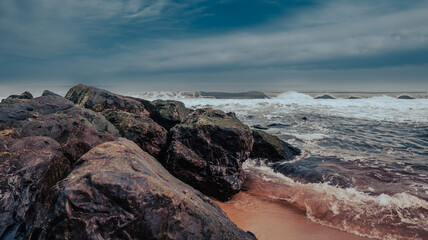 Waves Against Rocks