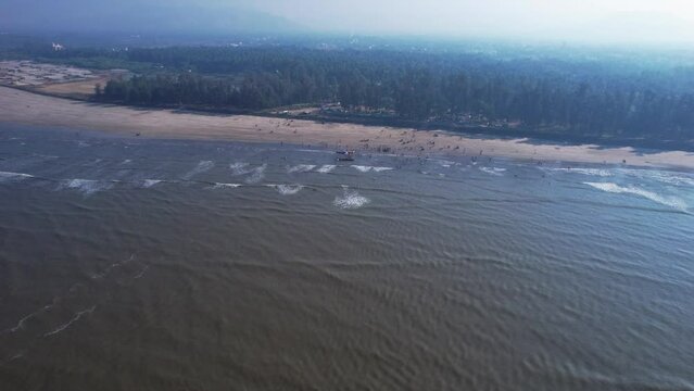 Aerial footage of Varsoli beach at Alibag, located 125 kms from Pune on the West Coast of Maharashtra India.