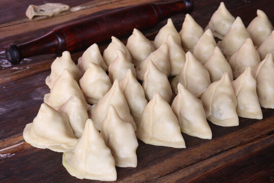 raw singara or samosa stock on kitchen