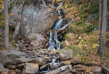 Waterfalls among autumn leaves on Mont Tremblant. Quebec. Canada.