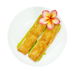 custard bread in a white plate isolated