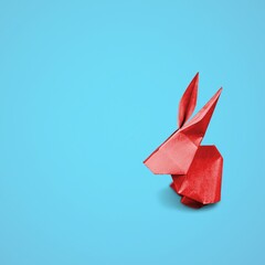 Red small rabbit or bunny paper origami