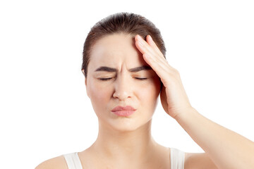 Woman has a headache or another pain. Close Up portrait white background