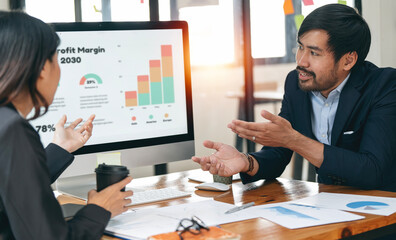 Two Businessperson Consulting meeting working and brainstorming new business project finance investment concept.