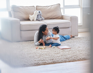 Baby, mom and living room fun of a mother and kid with toys for knowledge development. Smile,...