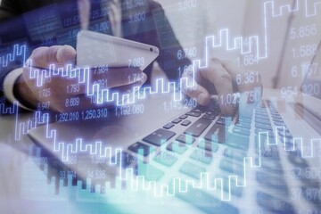 Business target and planning concept. Businessman works with financial graph