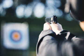Gun, target and person training outdoor for shooting range, game exercise or sports event closeup....