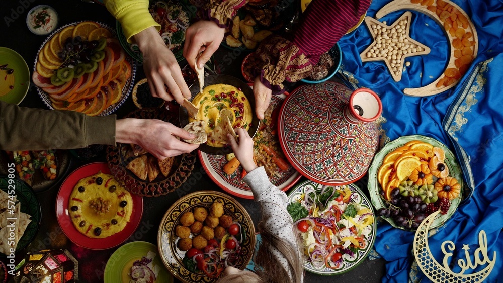 Wall mural eid holiday table. ramadan family dinner. breaking fast, iftar. arabic middle eastern traditional cu