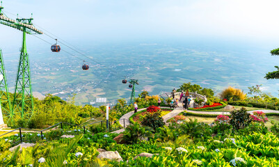 Tay Ninh, Vietnam - March 3rd, 2022: View from above to cable car area on top of Ba Den Mountain, the highest place in the Southern region to attract tourists to visit in Tay Ninh, Vietnam
