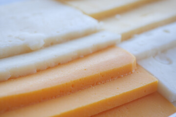Mozzarella slice of cheese on wooden table 