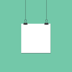 Fototapeta premium template of white paper clip with a green background