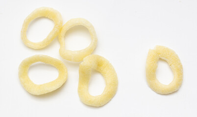 Chips from onion rings on a white background.