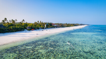 This stunning drone shot of Kiwengwa Beach in Zanzibar showcases the incredible beauty of the...
