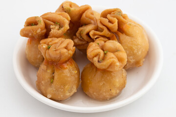 Kalash Gujiya Or Potli Gujia Meetha Also Called Pirukiya, Pirukia, Pedakiya, Karanji, Basundi, Gughra MIthai Is Made Of Suji Ghee Filled With Mawa Khoya Chasni Mava Khoa On Deepawali, Teez, Holi, Teej