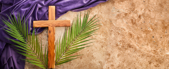 Lent season, Holy week and Good friday concept. Palm leave and cross on stone background - obrazy, fototapety, plakaty