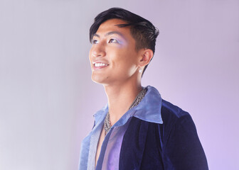 Makeup, smile and fashion, lgbt man from Indonesia with confidence isolated on purple background. Happy, aesthetic and male model with beauty in studio, creative non binary and gender neutral design.