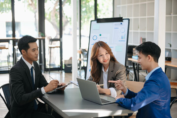 Portrait of success business people working together in office. Couple teamwork startup concept