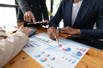 Asian entrepreneurs and businesspeople meeting in a conference room for business planning financial...