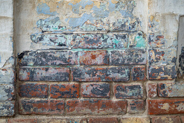 Vintage dirty coloured brick wall as a pattern, texture