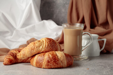 Croissants and coffee with cream.