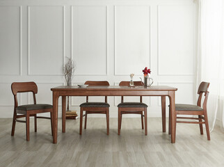 Wood dining table landscape with sunlight.