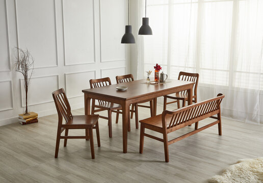 Wood dining table landscape with sunlight.