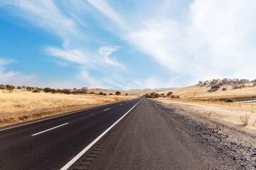 Asphalt road and countryside landscape