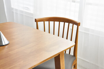 Wood dining table landscape with sunlight.