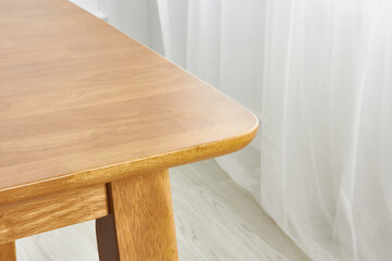 Wood dining table landscape with sunlight.