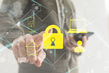 closeup concept of a male businessman standing pointing up a finger, wearing black suit, shirt and tie, representing interaction in technology within business industry, with grey flat background