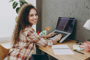 Side view young fun programmer student smart successful employee IT business woman of African...