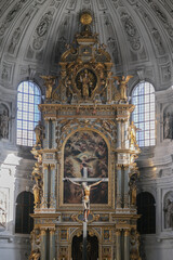Magnificent opulent splendid Bavarian baroque church cathedral basilica interiors with stucco, murals, altar, Pilars, ceiling paintings, gold, wood domes nave