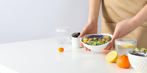 Concept of healthy food with acai smoothie, space for text