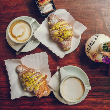 Italian breakfast with Pistachio croissant(corneto) and capuccino
