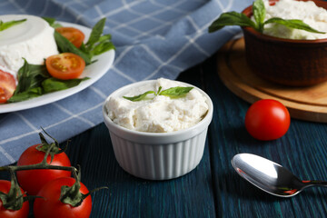 Concept of tasty dairy product - ricotta cheese