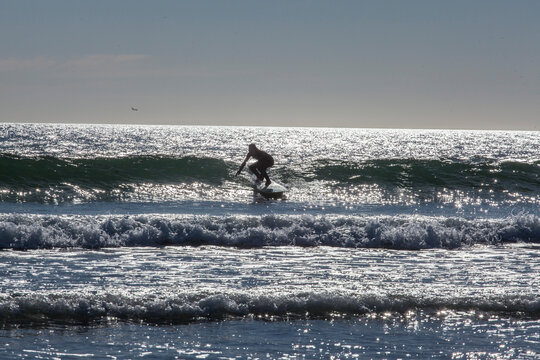 Woman surfing a wave