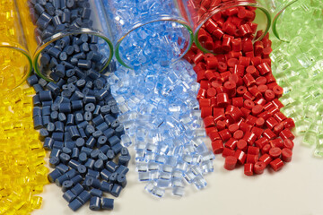 Colored plastic resins in test tubes in laboratory