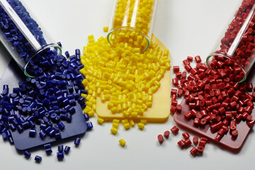 Colored plastic resins with it's test and color samples in laboratory