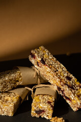 Homemade Granola energy bar. Variety of homemade protein granola breakfast bars with nuts, raisins dried cherries and chocolate. Healthy nutrition eating Gluten free cereal dieting snack super food