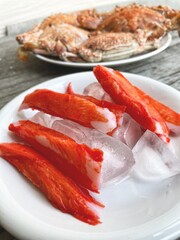 Crab sticks on wood background