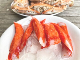 Crab sticks on wood background
